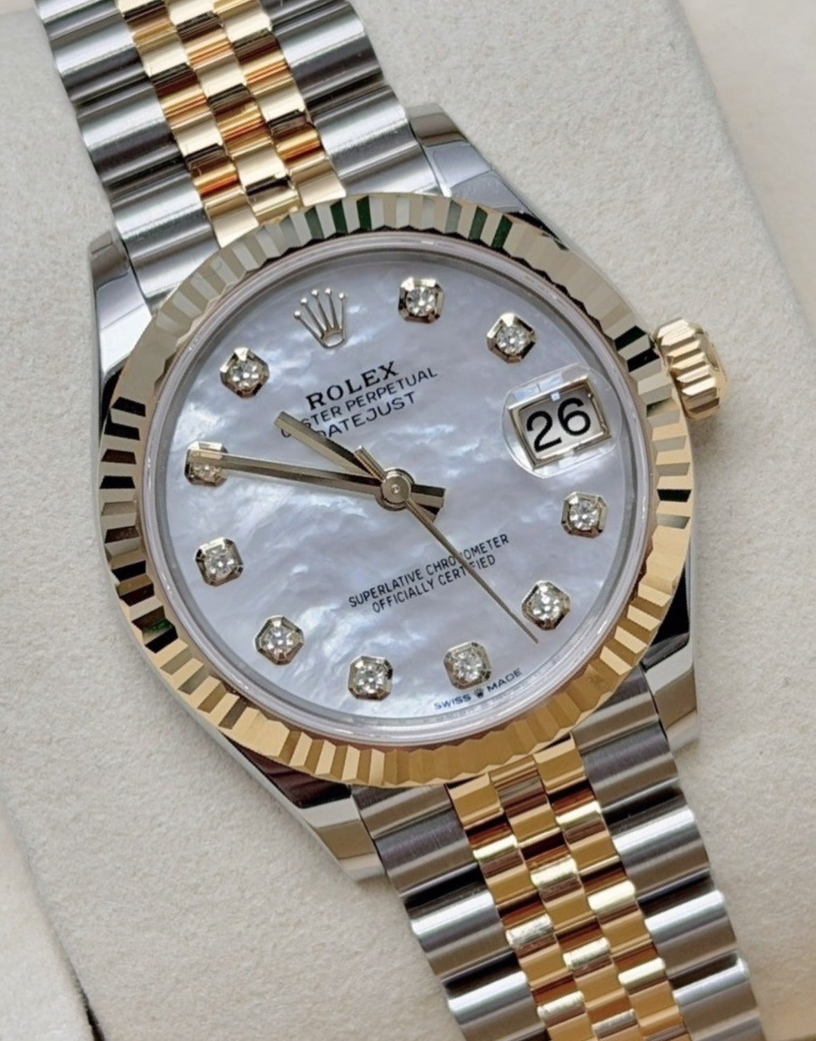 Rolex Datejust 28 279173 (2026) – Yellow Rolesor, Mother-of-Pearl Diamond Dial, Fluted Bezel, Jubilee